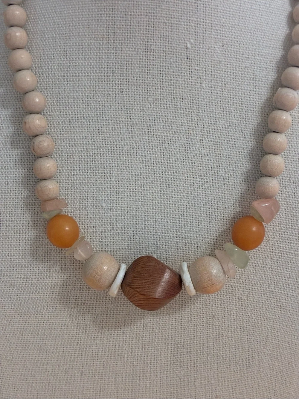The item in the image is a vintage beaded statement necklace.